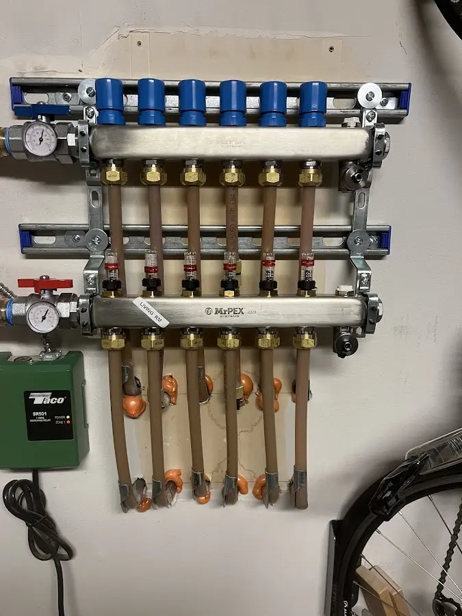 Plumber performing Gas Leak Detection at a residential property in Swanzey